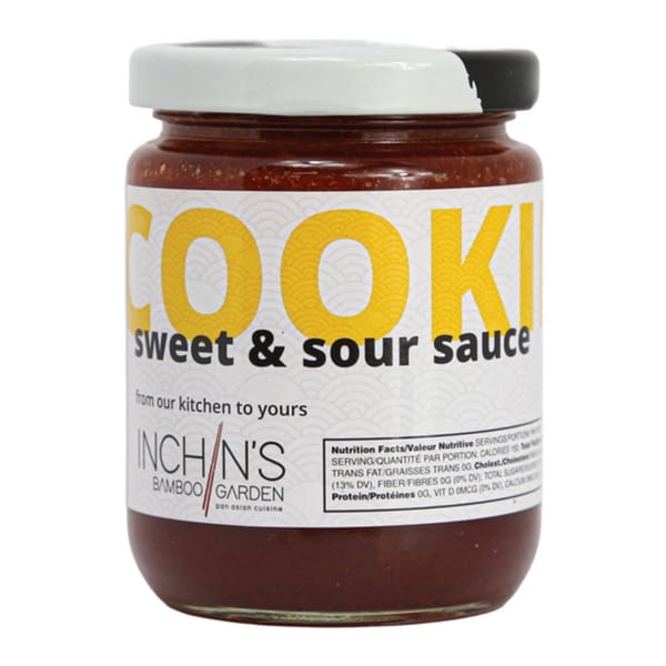 A jar of Inchin's Bamboo Garden sweet and sour sauce with a white label and nutrition facts.